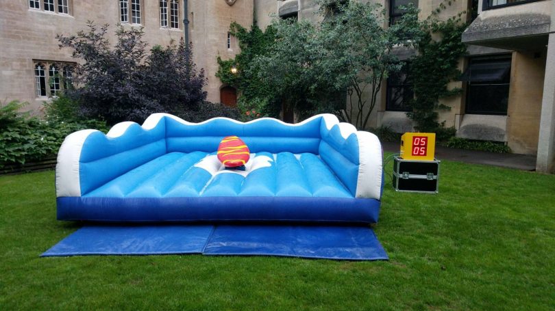 Inflatable surf simulator